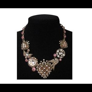 Betsy Johnson necklace. Little nick on round crystal stone hardly noticeable.
